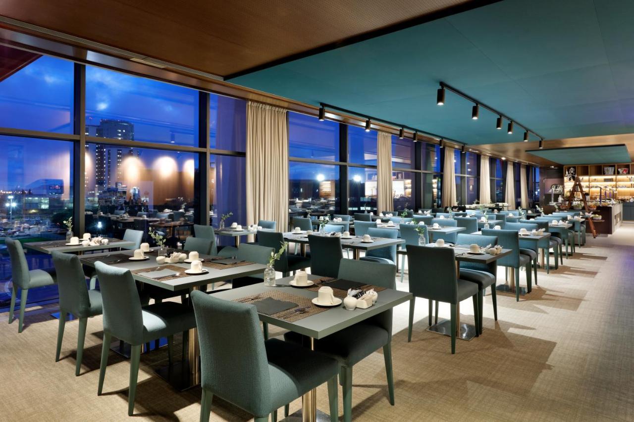 Hotel Hyatt Regency Barcelona Tower L'Hospitalet de Llobregat Esterno foto The restaurant